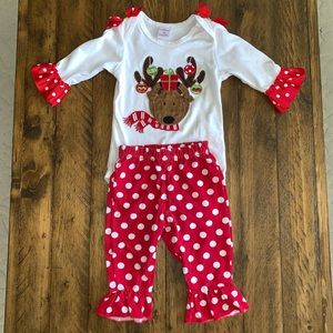 Christmas onesie with matching pants.